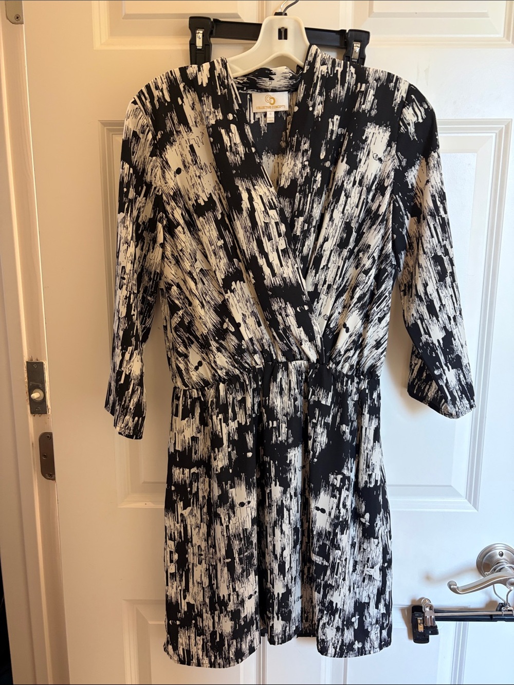 Collective Concepts Black and White Abstract Mini Wrap Dress